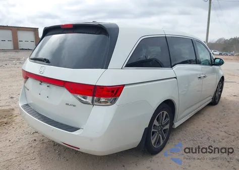 2014 Honda Odyssey Touring/Touring Elite z USA, uszkodzony, nr VIN 5FNRL5H97EB077018